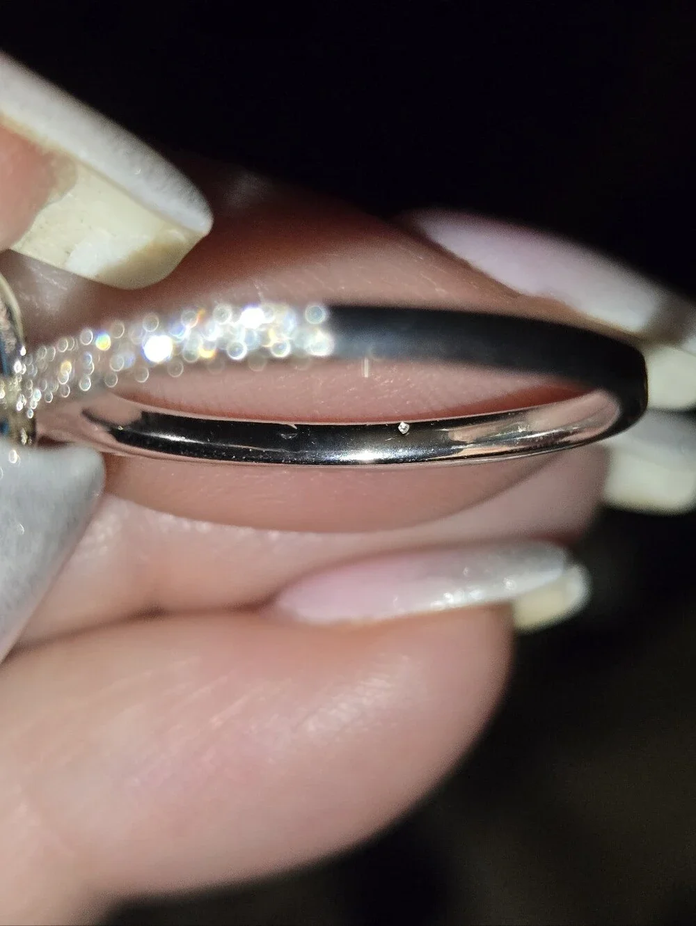 Blue Emerald-Cut Halo Ring with Accent Stones